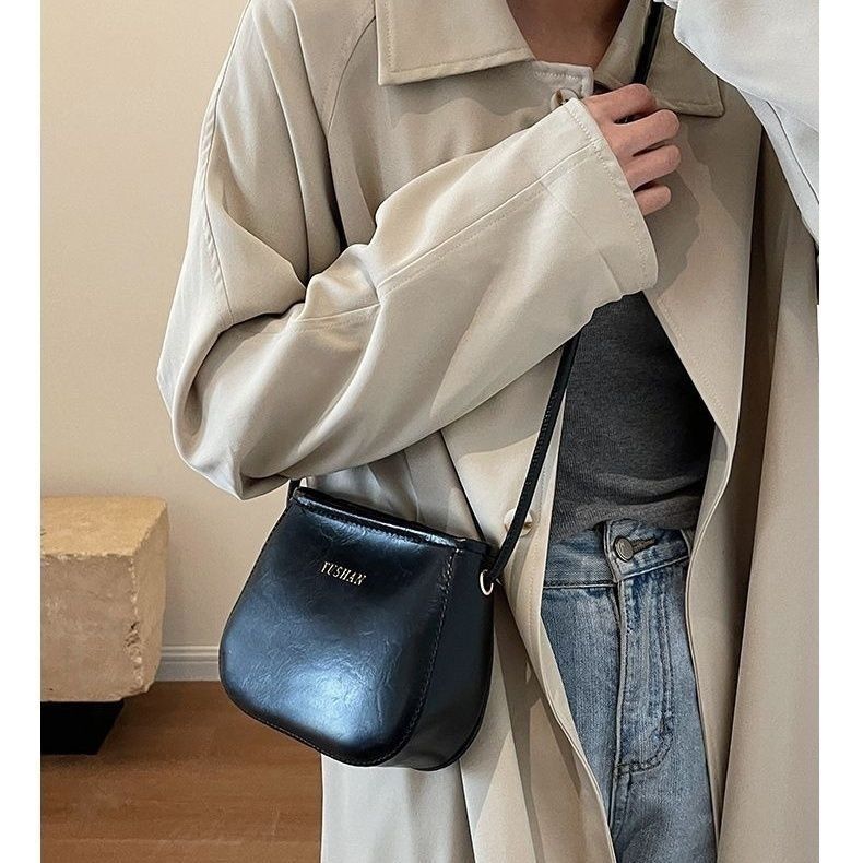 搭单肩斜挎包复古水桶