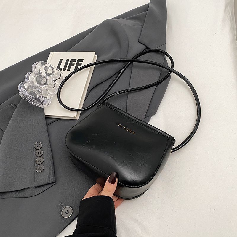 搭单肩斜挎包复古水桶